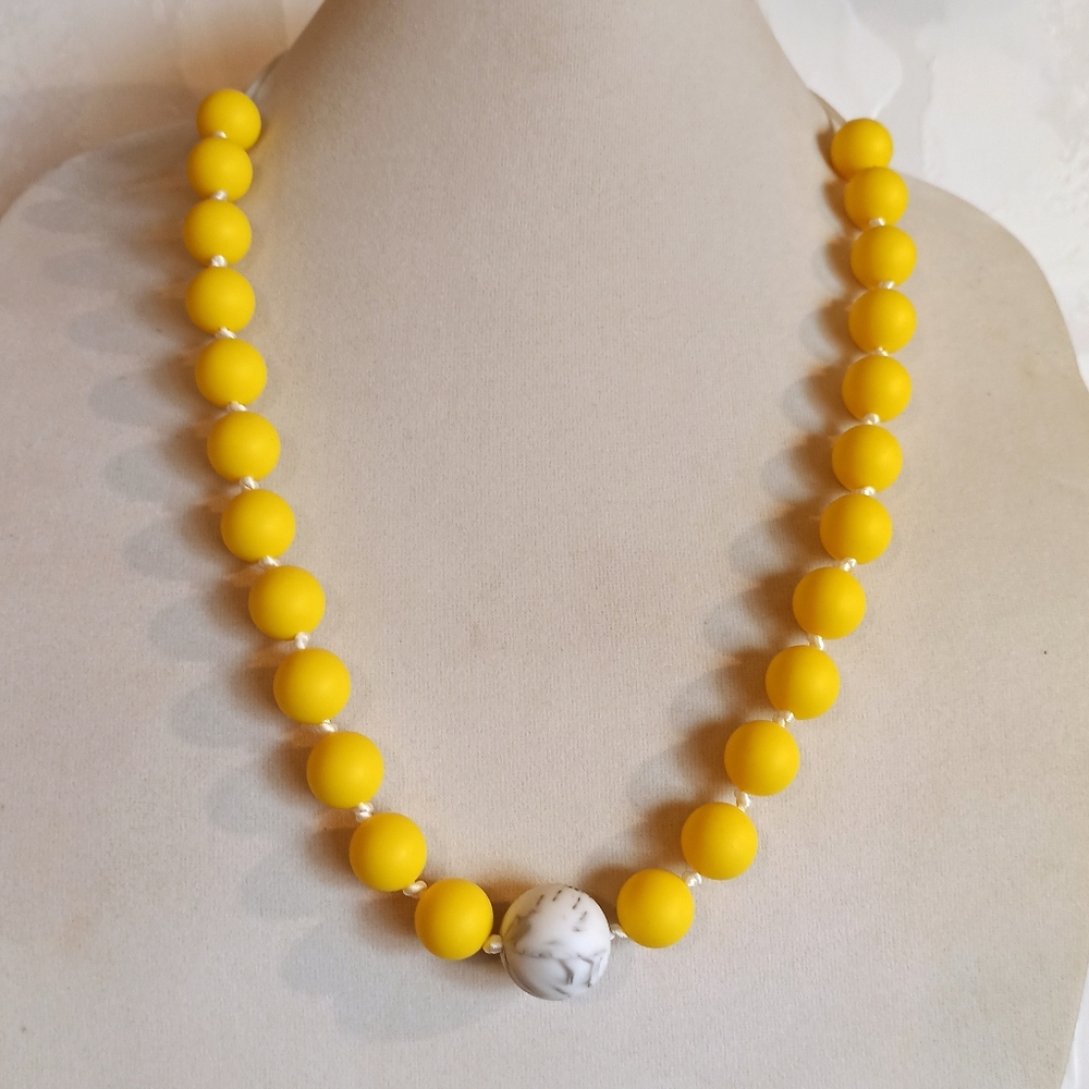 Yellow silicone teething necklace